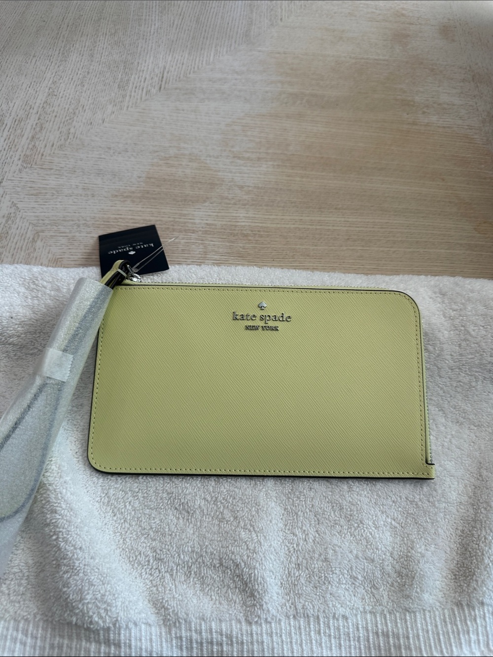 kate spade NWT lemon-yellow wristlet pouch
